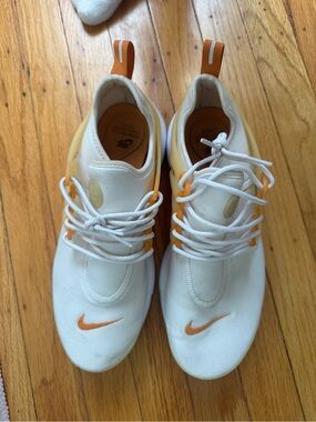Nike Women’s White and Orange Casual Slip-On Sneakers
